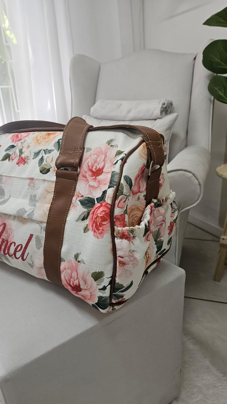 Floral-patterned bag on a white surface