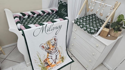    Luxury safari-inspired baby cot bedding in forest green, blush pink and white