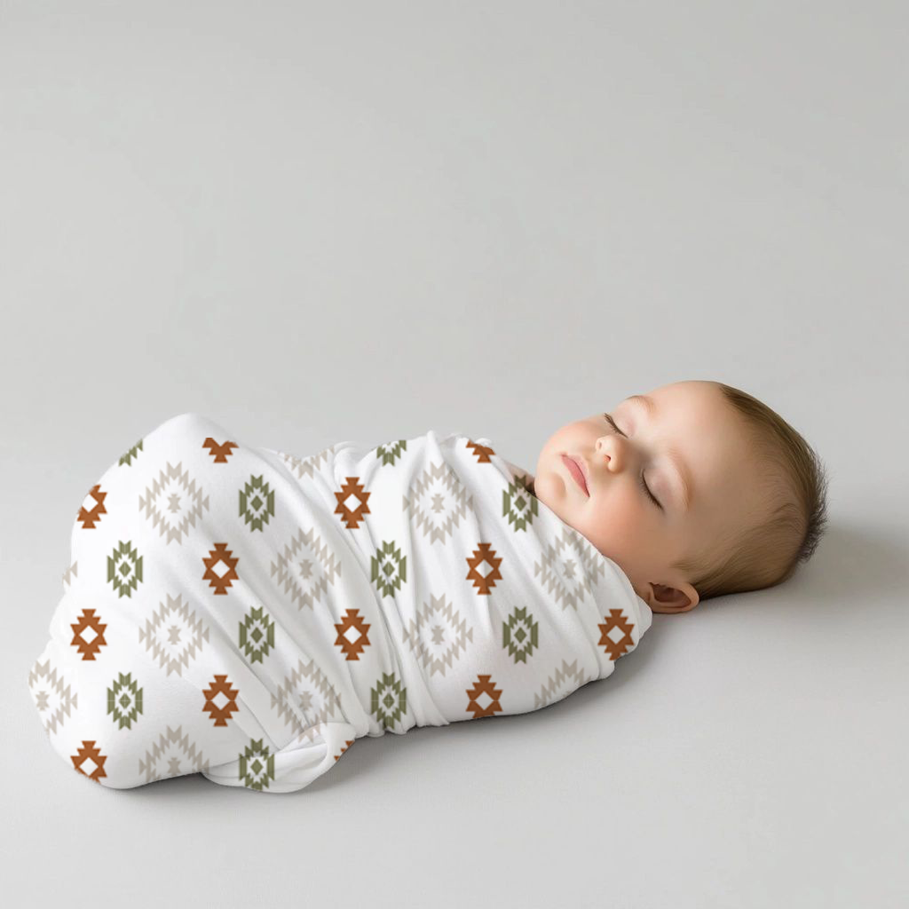 Boho themed baby swaddle set featuring geometric tribal-style patterns in rust, olive green and soft neutral tones on a clean white background | Boho-tema baba-inbakerstel met geometriese stamstyl-patrone in roes, olyfgroen en sagte neutrale kleure op ’n skoon wit agtergrond.2