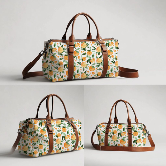 Peachy hospital bag featuring a fresh peach and green leaf print on a white background with brown handles and a matching shoulder strap | Peachy hospitaaltas met ’n vars perske- en groen blaarpatroon op ’n wit agtergrond met bruin handvatsels en ’n bypassende skouerband.